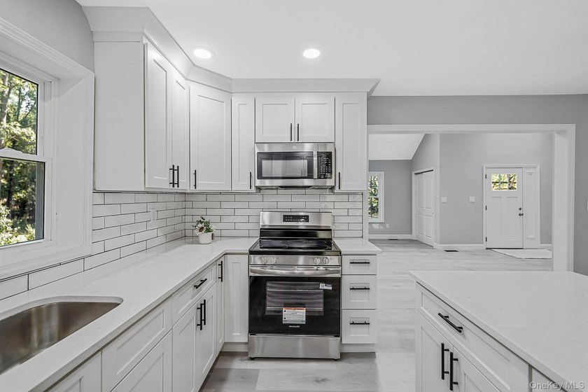 Welcome to 3 Cozine Road South in Center Moriches! Completely - photo 12