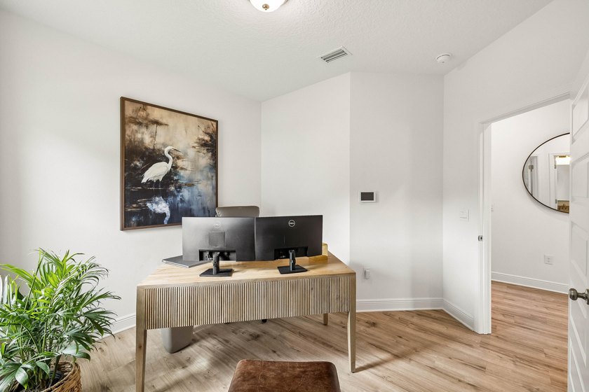 Located on a builder-designated premium lot in the more private - photo 24