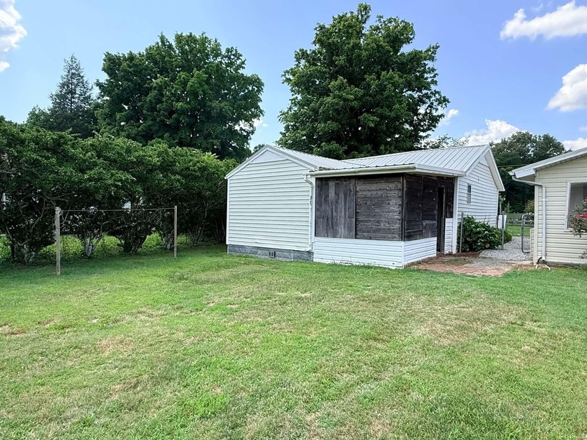 Charming 2BR/2BA home on .41 acres featuring owned solar panels - photo 29