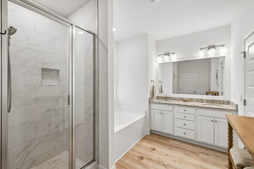 Located on a builder-designated premium lot in the more private - photo 29