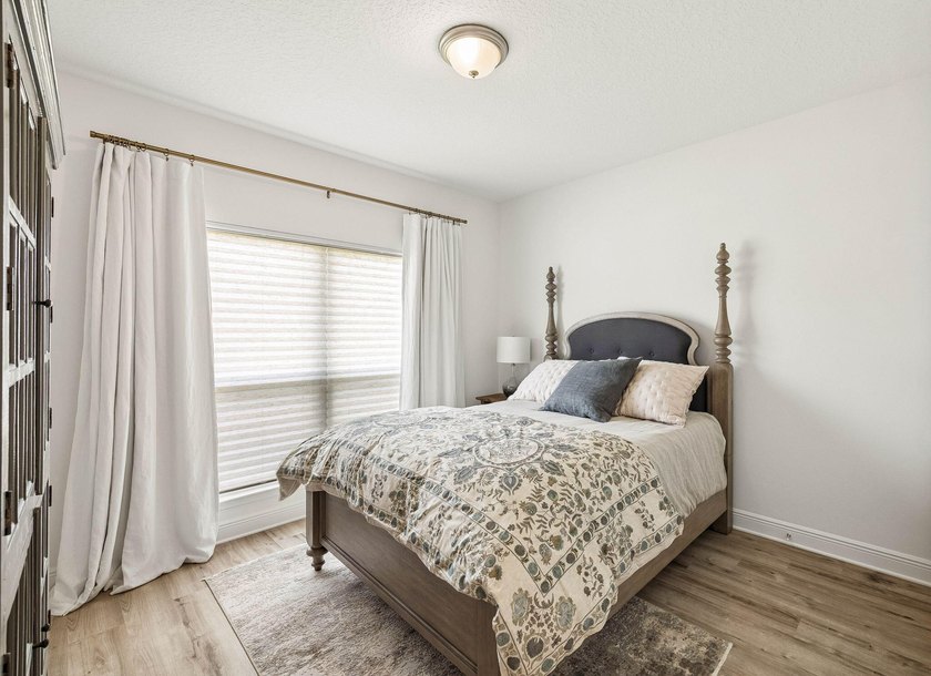 Located on a builder-designated premium lot in the more private - photo 34