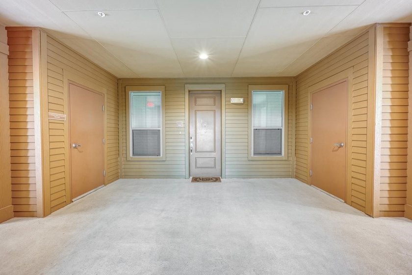Discover the ultimate retreat in this updated Penthouse-level - photo 6