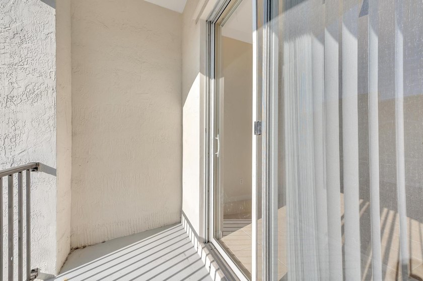 Take a look at this stunning 2 bed 2 bath condo with a 1 car - photo 25