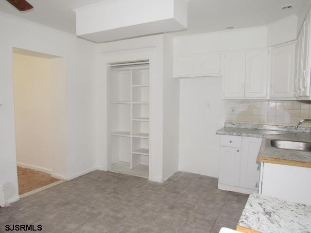 Spacious 4-bedroom, 2-bath attached single-family home located - photo 22
