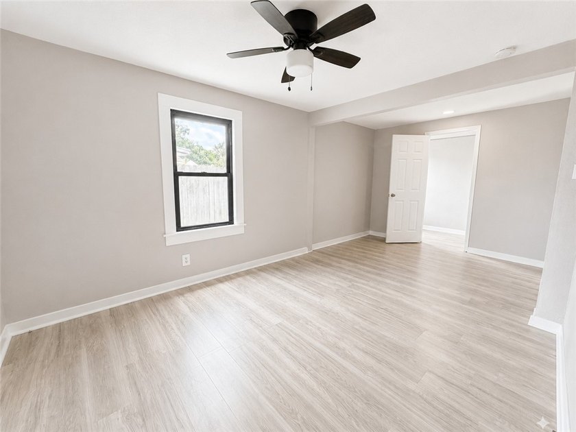 This charming 3-bedroom, 1-bath home offers 1,080 square feet of - photo 4