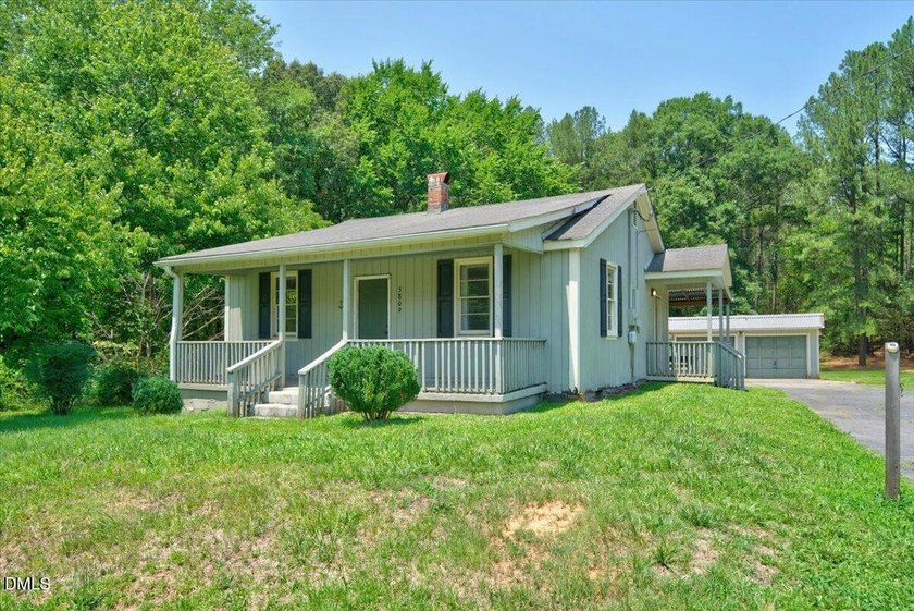 Welcome home to this charming ranch situated on a spacious 0 - photo 3