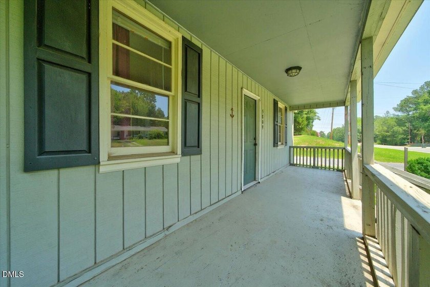 Welcome home to this charming ranch situated on a spacious 0 - photo 4
