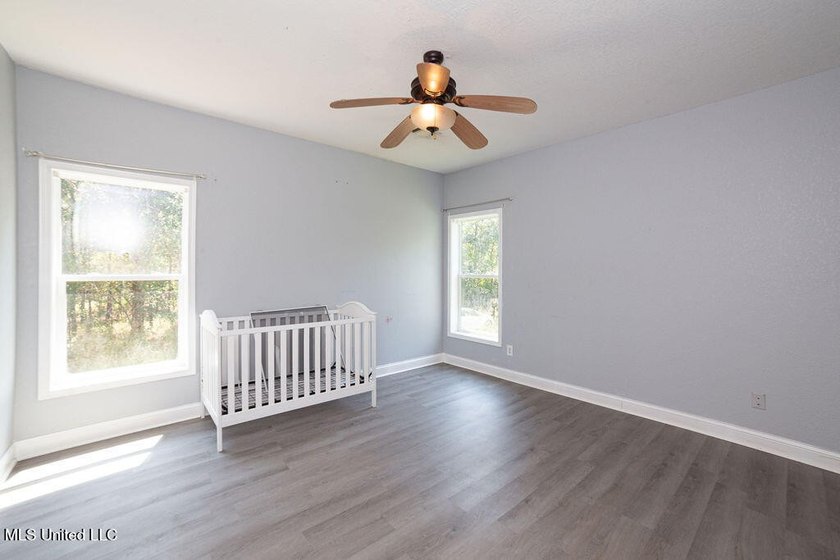 Charming 3-Bedroom Home in Waveland Lot goes street to street - photo 11