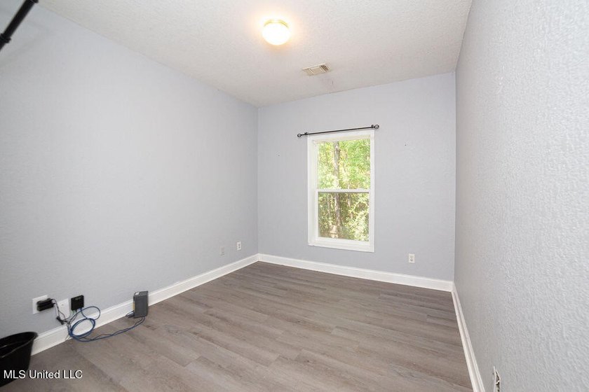 Charming 3-Bedroom Home in Waveland Lot goes street to street - photo 17