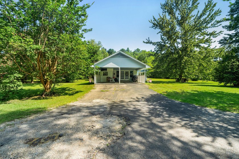 As you arrive, you'll be welcomed by a recently paved driveway - photo 26