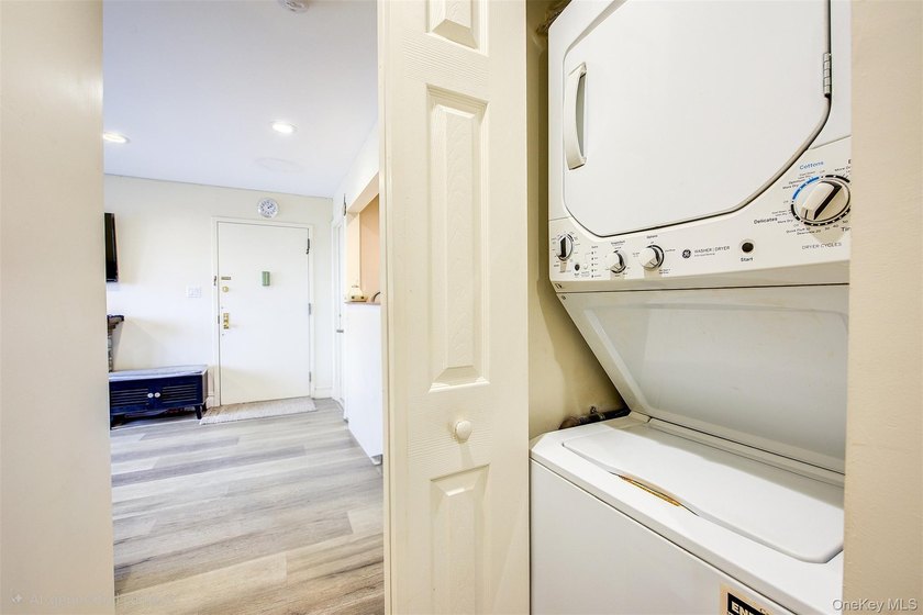 Experience modern condominium living in this beautifully - photo 9