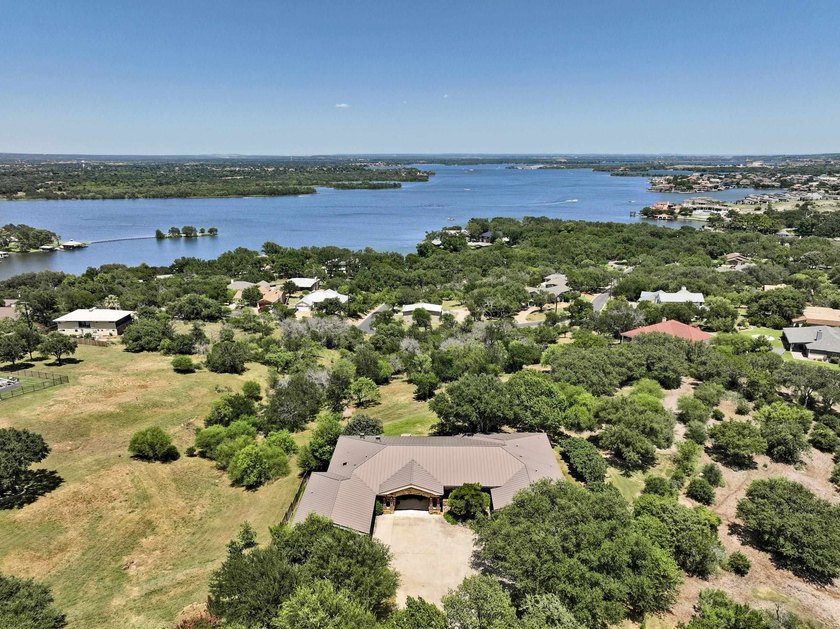 Set beyond a private gated entrance atop 3.2 acres spanning two - photo 2
