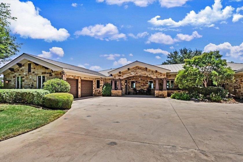 Set beyond a private gated entrance atop 3.2 acres spanning two - photo 4