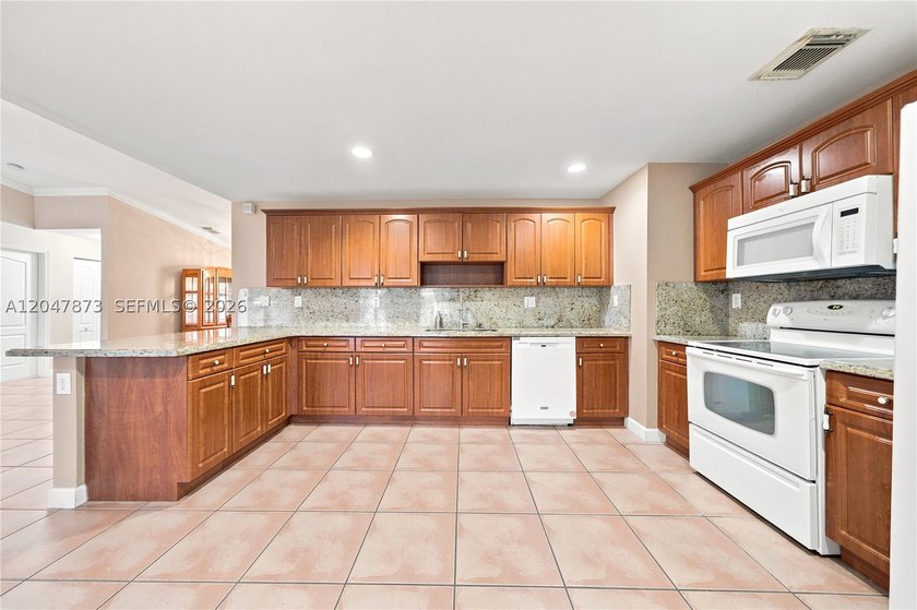 Welcome to this exceptional residence, offered for the first - photo 11