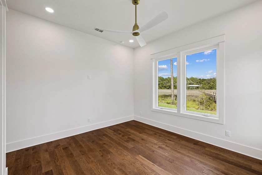 Welcome home to waterfront living on Eden Drive. This brand new - photo 34