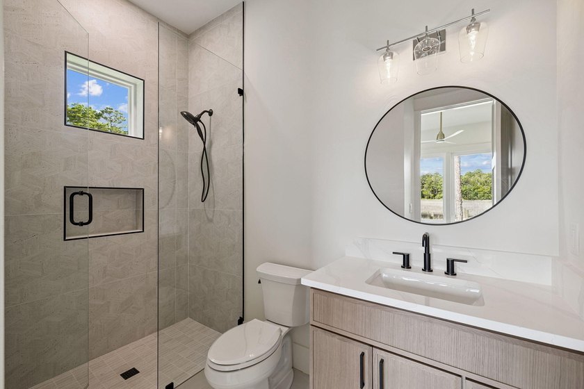 Welcome home to waterfront living on Eden Drive. This brand new - photo 36