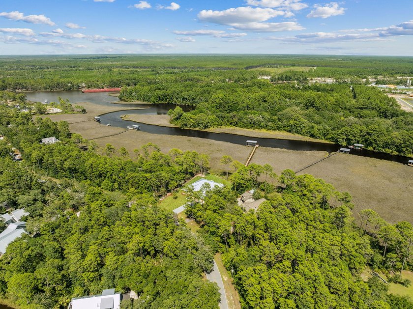Welcome home to waterfront living on Eden Drive. This brand new - photo 41