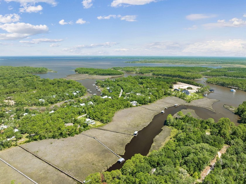 Welcome home to waterfront living on Eden Drive. This brand new - photo 43