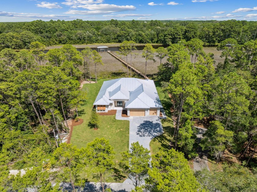 Welcome home to waterfront living on Eden Drive. This brand new - photo 44