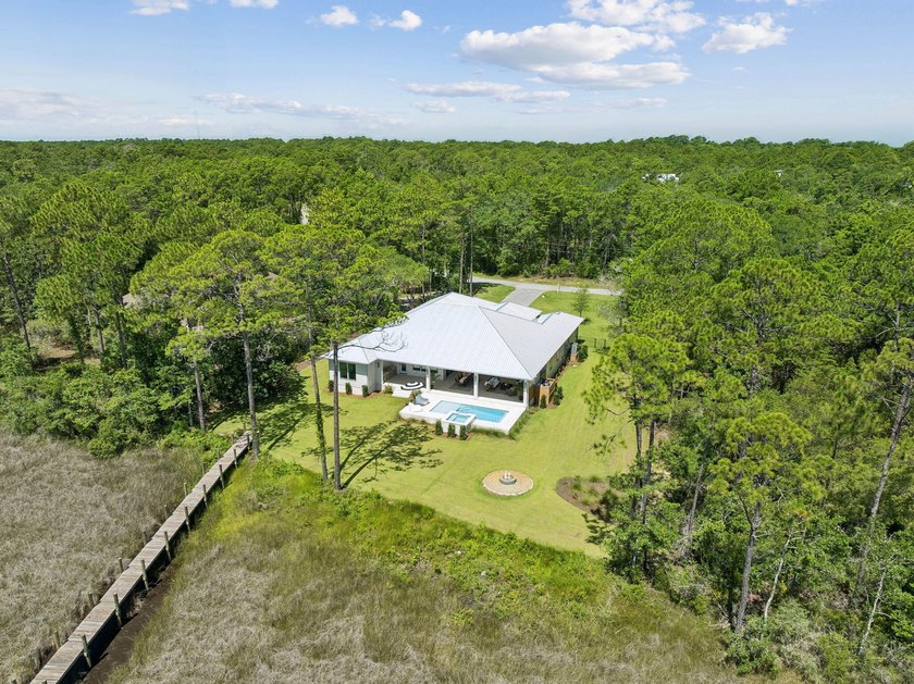 Welcome home to waterfront living on Eden Drive. This brand new - photo 46