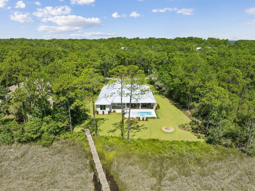 Welcome home to waterfront living on Eden Drive. This brand new - photo 47