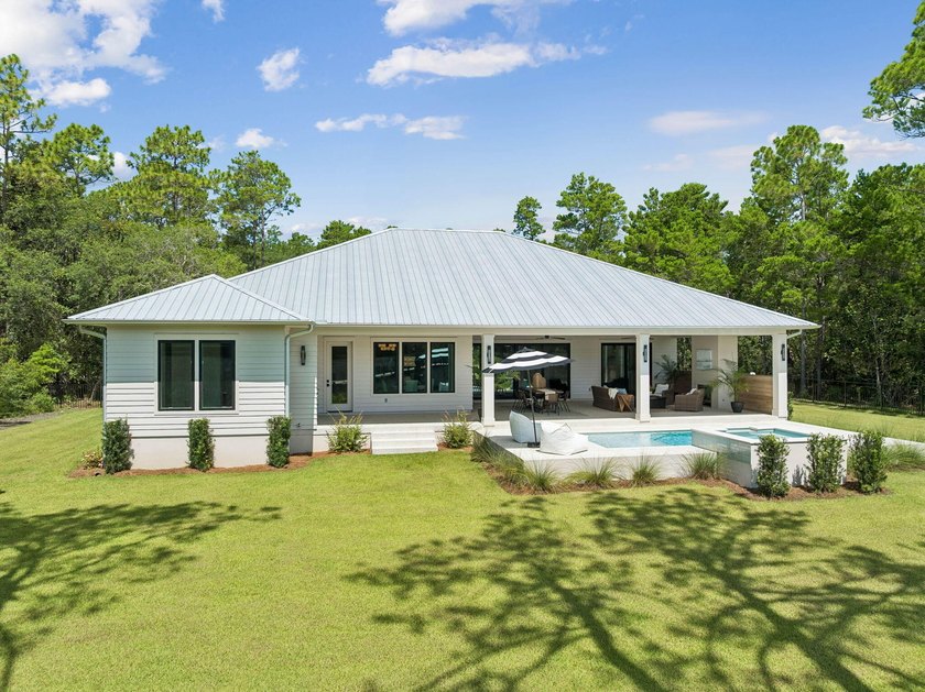 Welcome home to waterfront living on Eden Drive. This brand new - photo 48