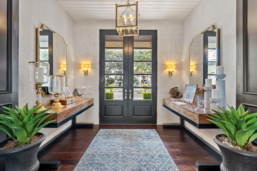 Nestled along the coveted waterfront on Lighthouse Drive in - photo 4