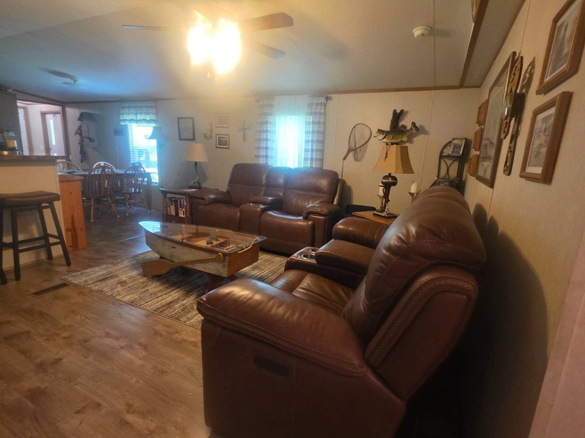 Discover peaceful living near the water with this 2-bedroom - photo 5