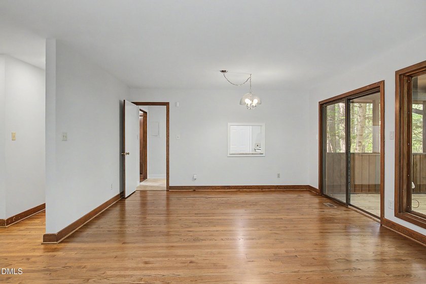 Tucked away on a sprawling corner lot of over 1/2 an acre in the - photo 6