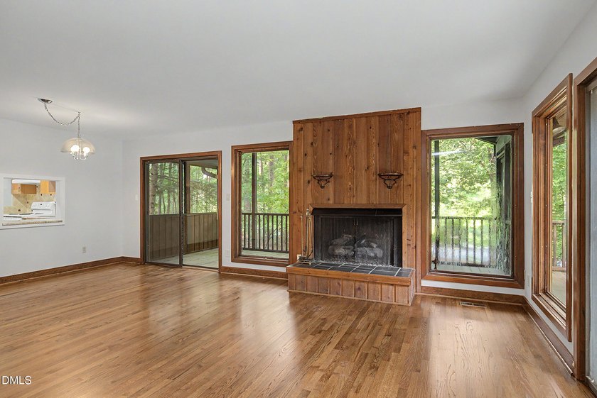 Tucked away on a sprawling corner lot of over 1/2 an acre in the - photo 7