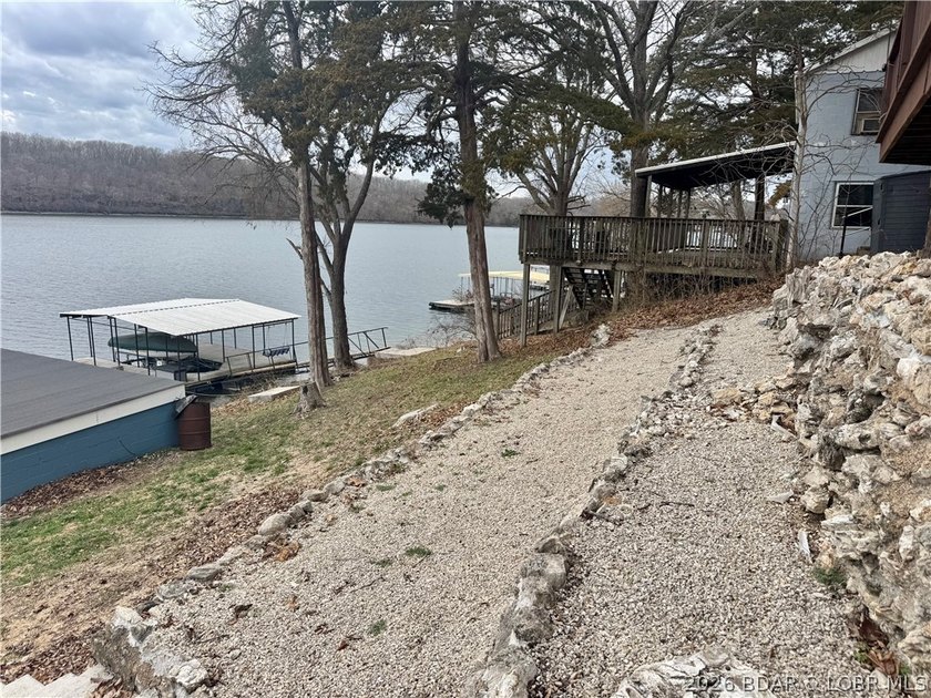 Tucked along the shoreline in year-round deep water, this - photo 35