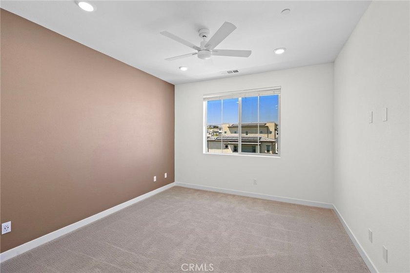 Experience the beauty of this former model home located in the - photo 21