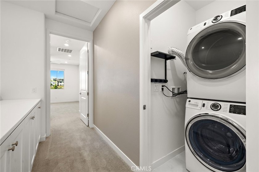Experience the beauty of this former model home located in the - photo 30