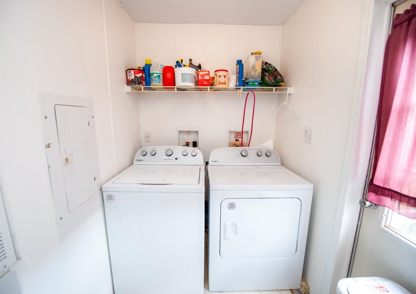 This 3 bedroom, 2 bath manufactured home is on a level .60 acre - photo 11