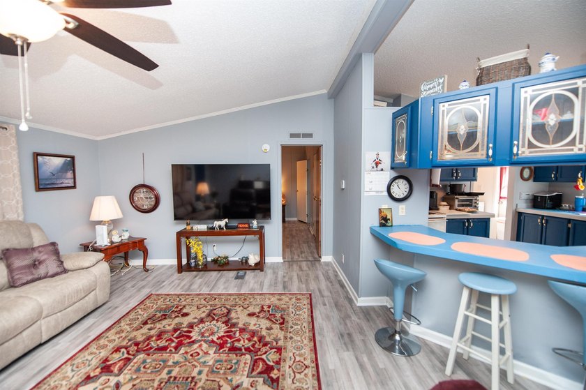 This 3 bedroom, 2 bath manufactured home is on a level .60 acre - photo 12