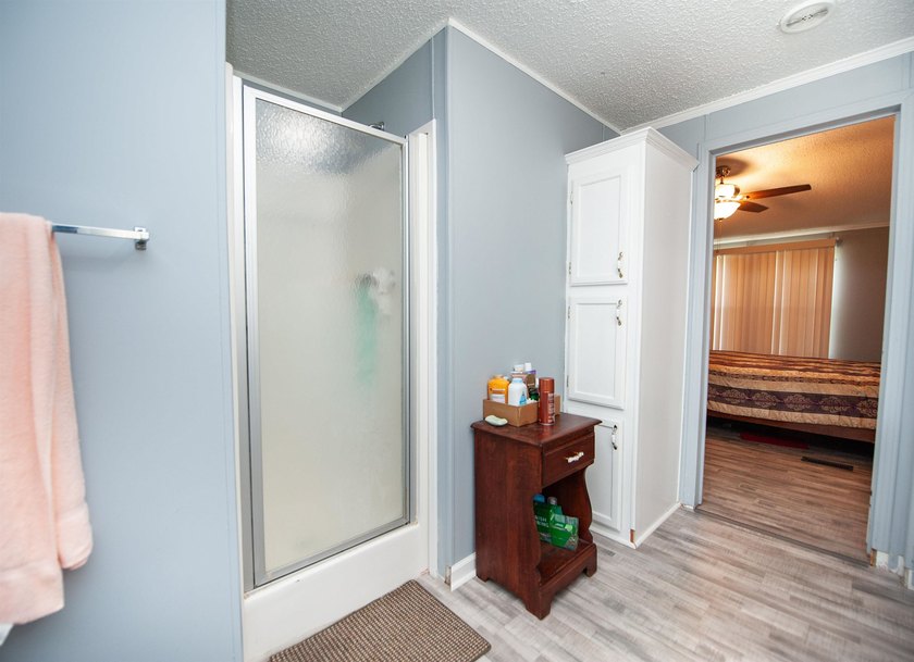 This 3 bedroom, 2 bath manufactured home is on a level .60 acre - photo 17