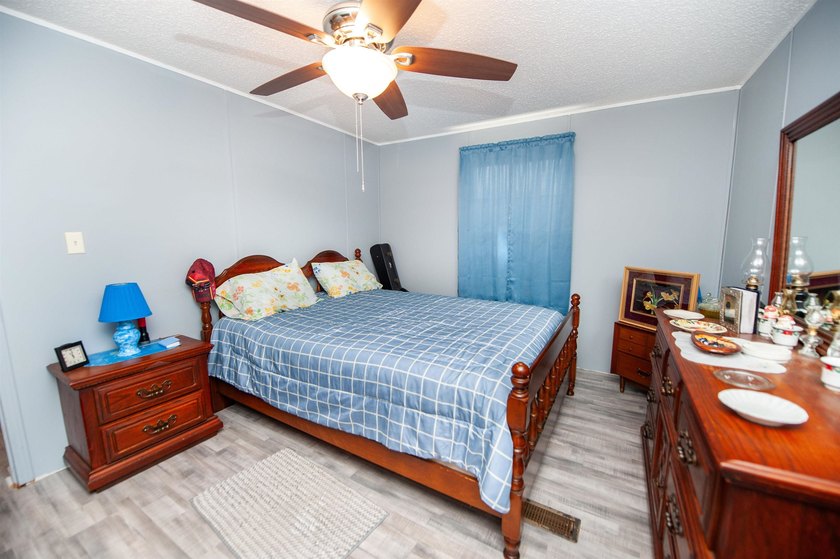 This 3 bedroom, 2 bath manufactured home is on a level .60 acre - photo 20