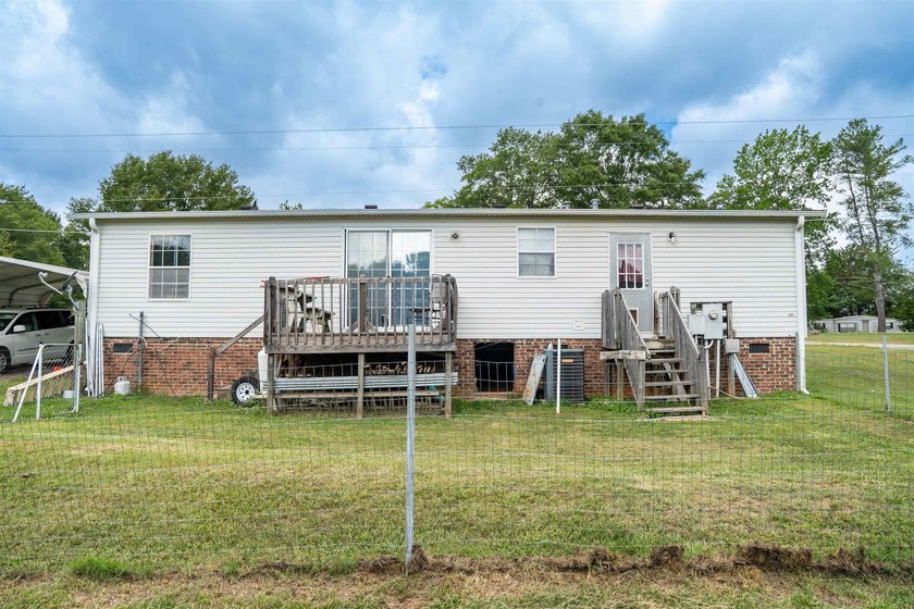 This 3 bedroom, 2 bath manufactured home is on a level .60 acre - photo 22