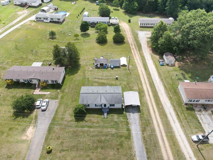 This 3 bedroom, 2 bath manufactured home is on a level .60 acre - photo 26