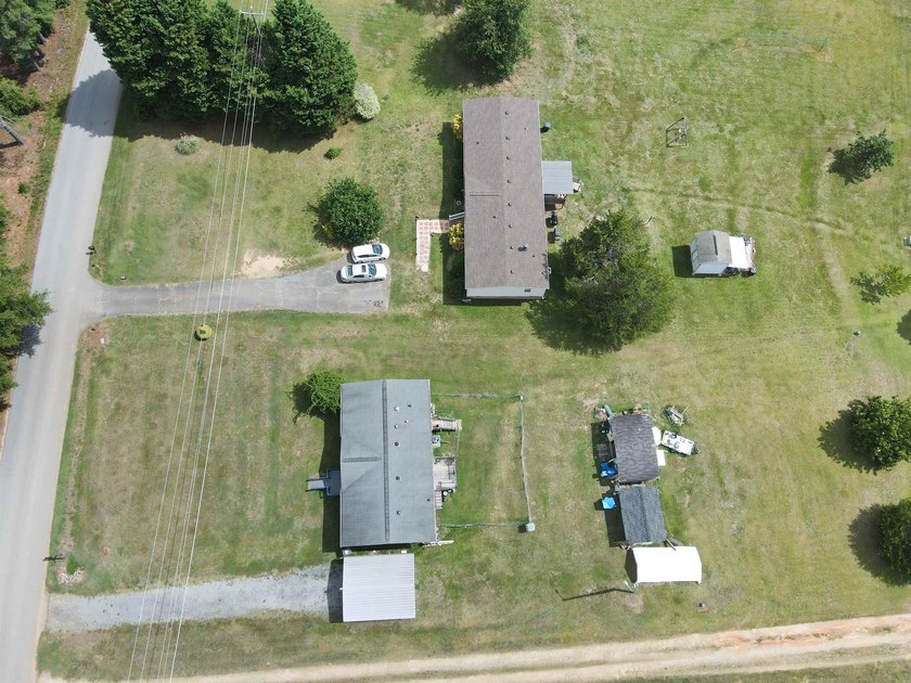 This 3 bedroom, 2 bath manufactured home is on a level .60 acre - photo 30