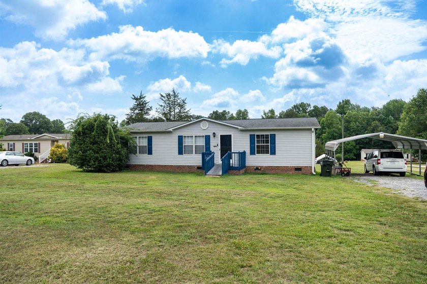 This 3 bedroom, 2 bath manufactured home is on a level .60 acre - photo 32