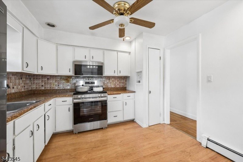 Welcome home to this beautifully maintained 3-bedroom bi-level - photo 15