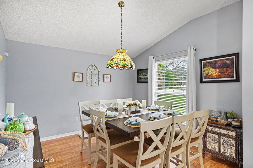Discover this beautiful 4-bedroom, 2-bath POOL home located in - photo 3