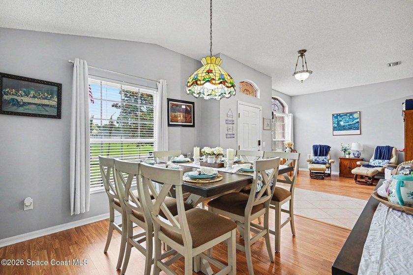 Discover this beautiful 4-bedroom, 2-bath POOL home located in - photo 4