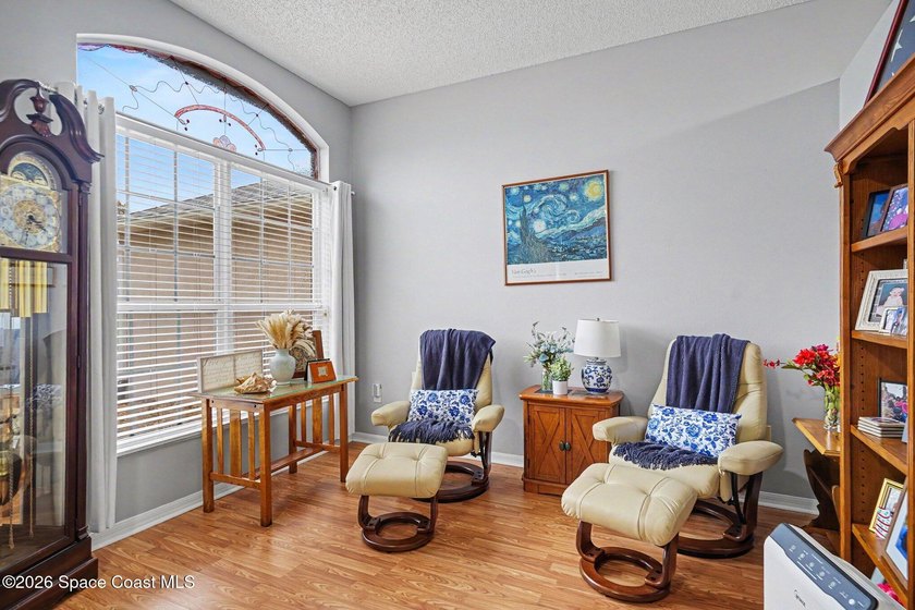 Discover this beautiful 4-bedroom, 2-bath POOL home located in - photo 5