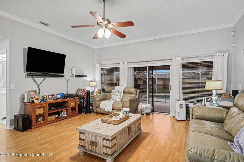 Discover this beautiful 4-bedroom, 2-bath POOL home located in - photo 10