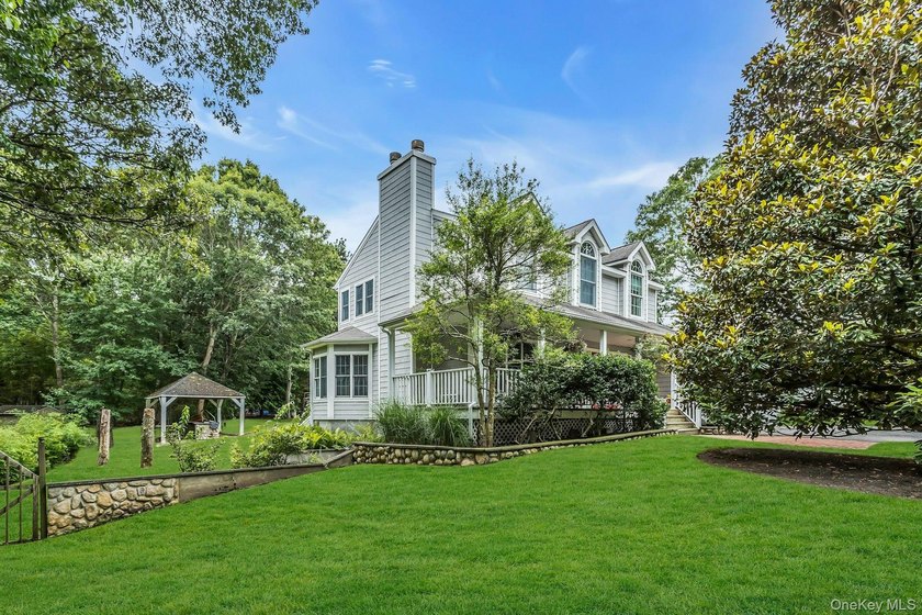 HAMPTON BAYS -- COASTAL LIVING AT ITS BEST Nestled on a private - photo 3