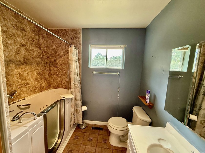 Welcome home to this charming 3-bedroom 2-bath home in a - photo 18