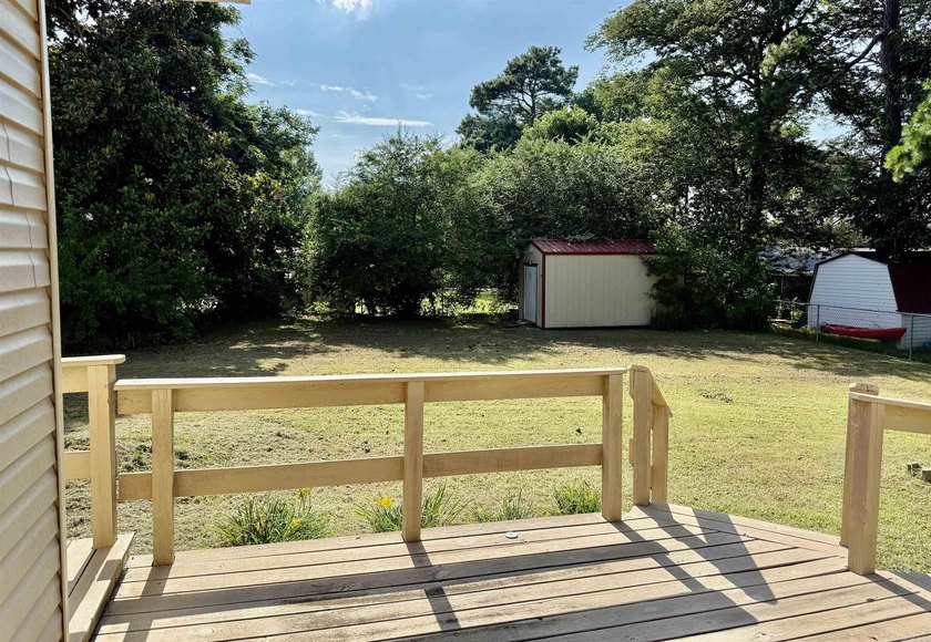 Welcome home to this charming 3-bedroom 2-bath home in a - photo 19