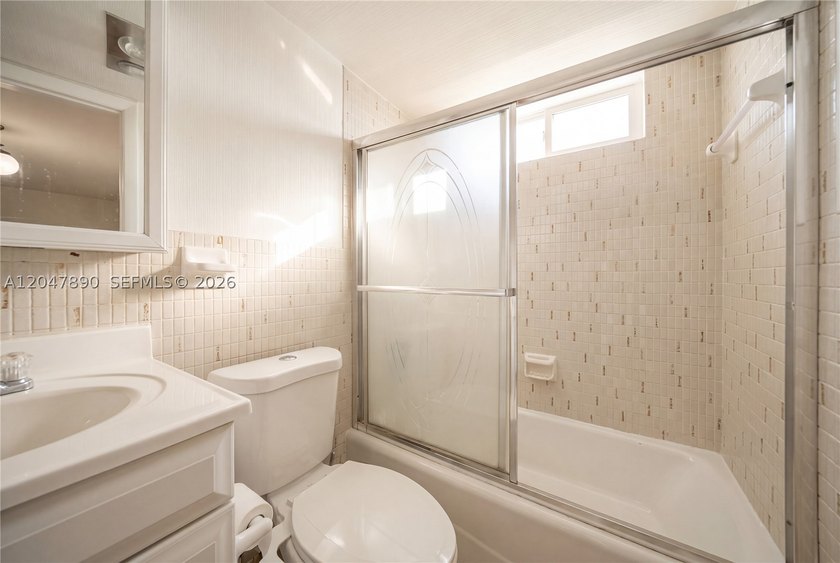 Experience peaceful waterfront living in this charming 1-bedroom - photo 23